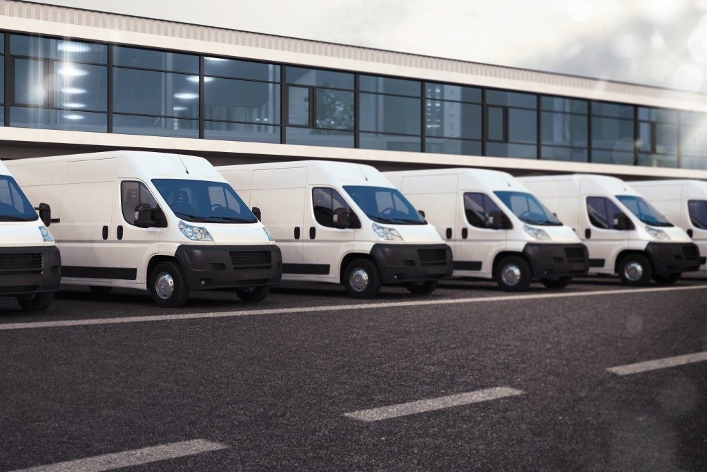 parked delivery vans in a row
