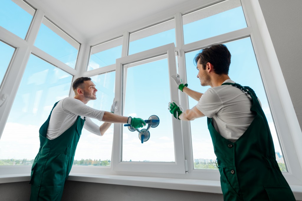 workers installing windows