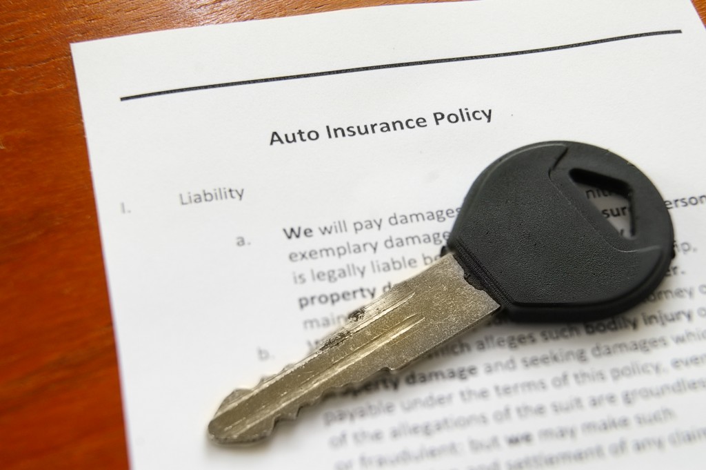 car keys on auto insurance policy