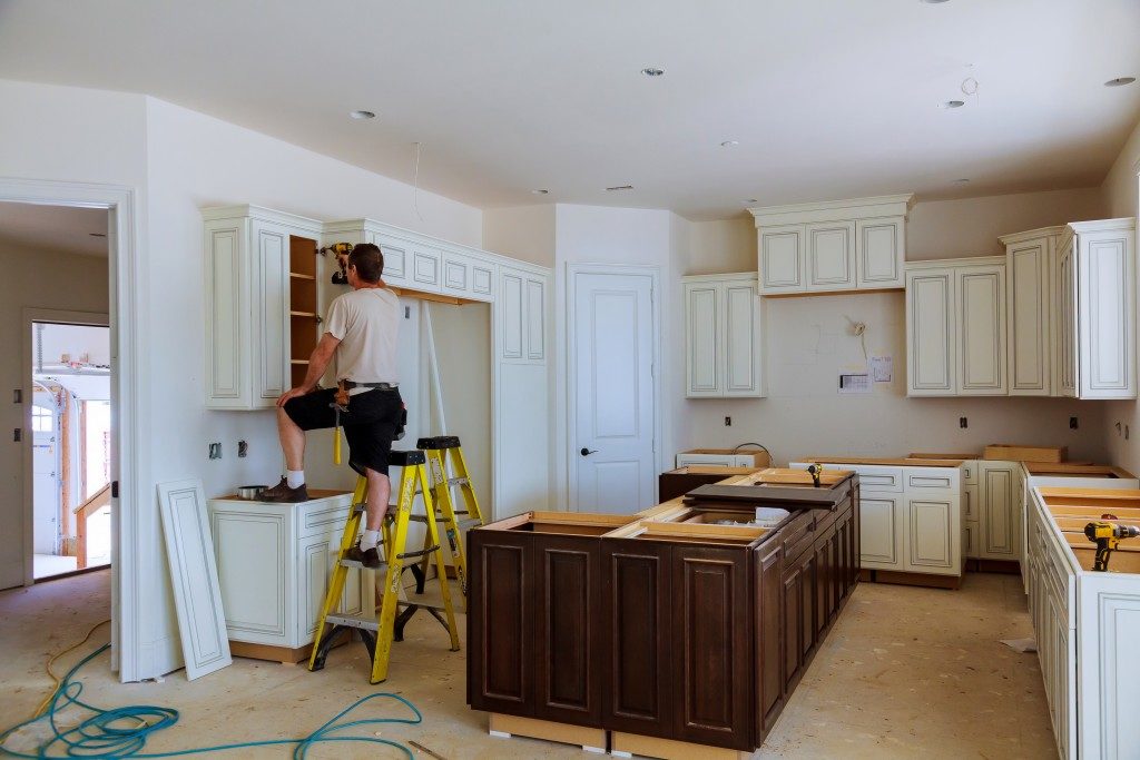 Man renovating the kitchen