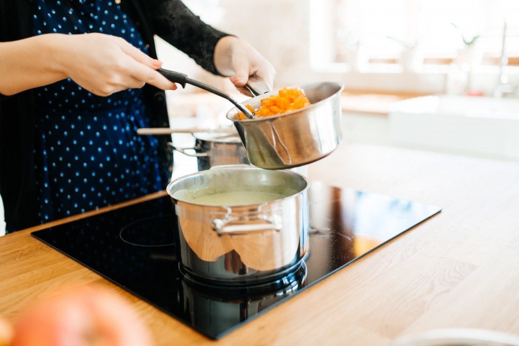 woman cooking a meal