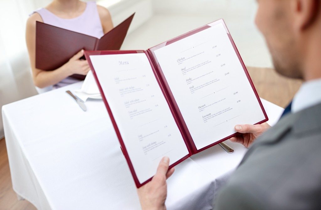 couple looking at the menu