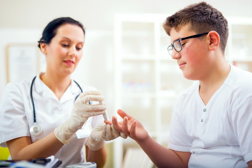 getting blood sample from kid