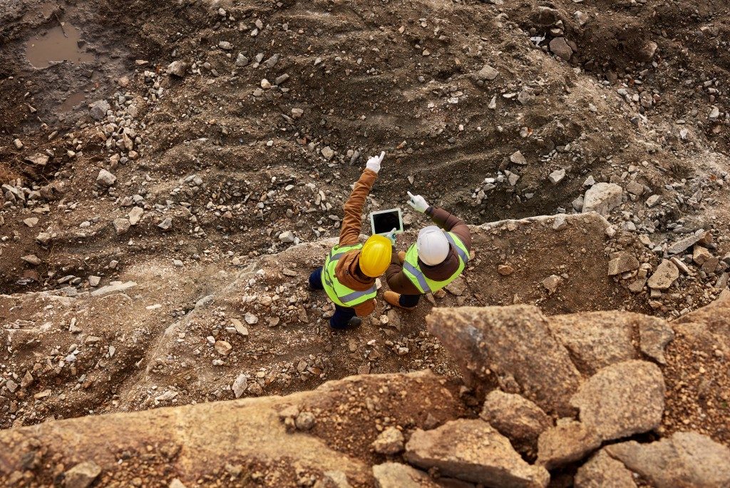 aerial view of professional workers in the mining site