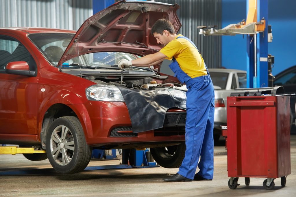 mechanic fixing a car