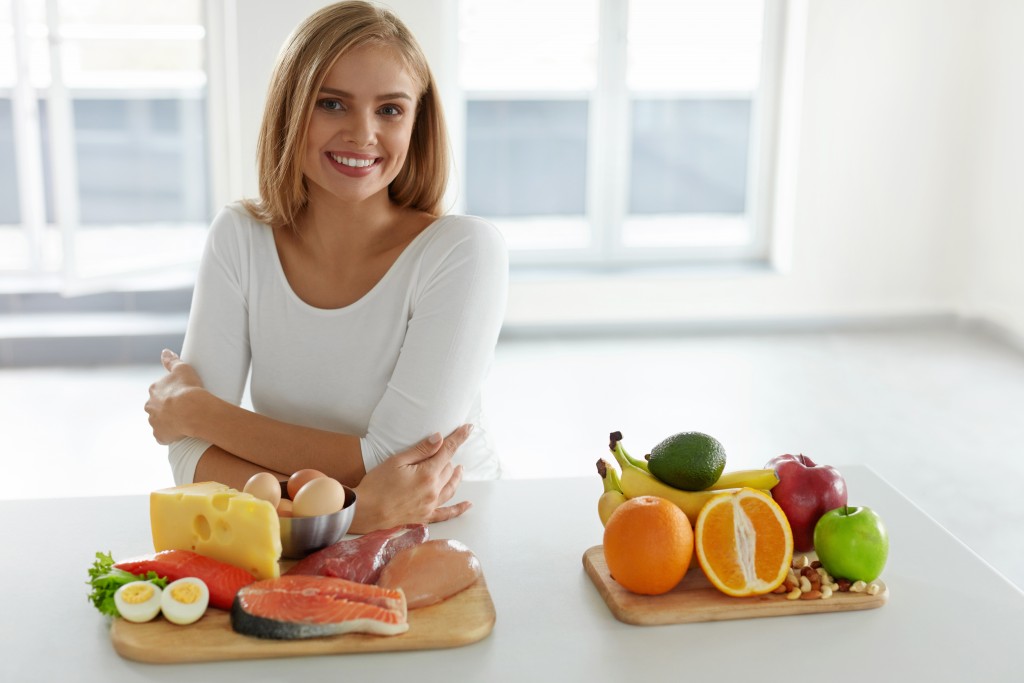 woman with healthy foods