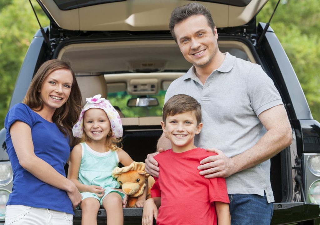 family by the car