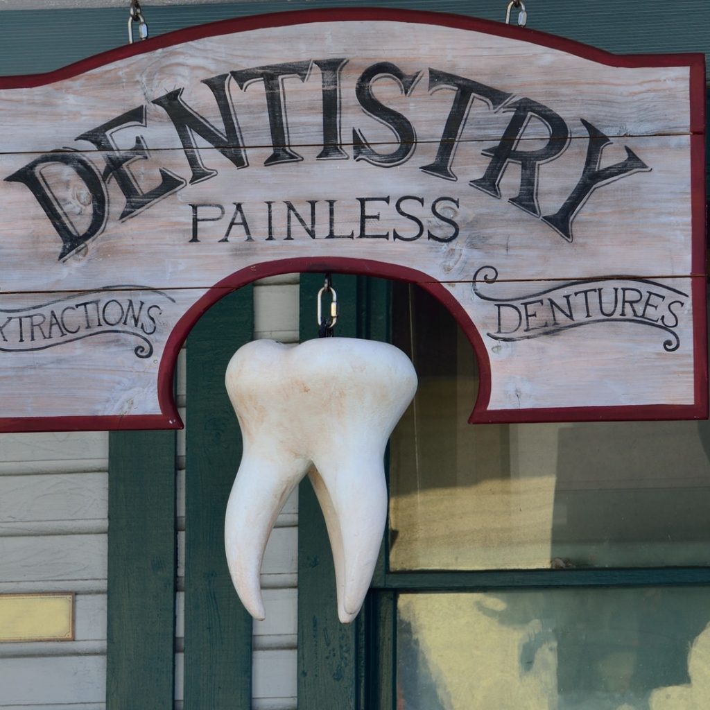 Dentistry Painless sign