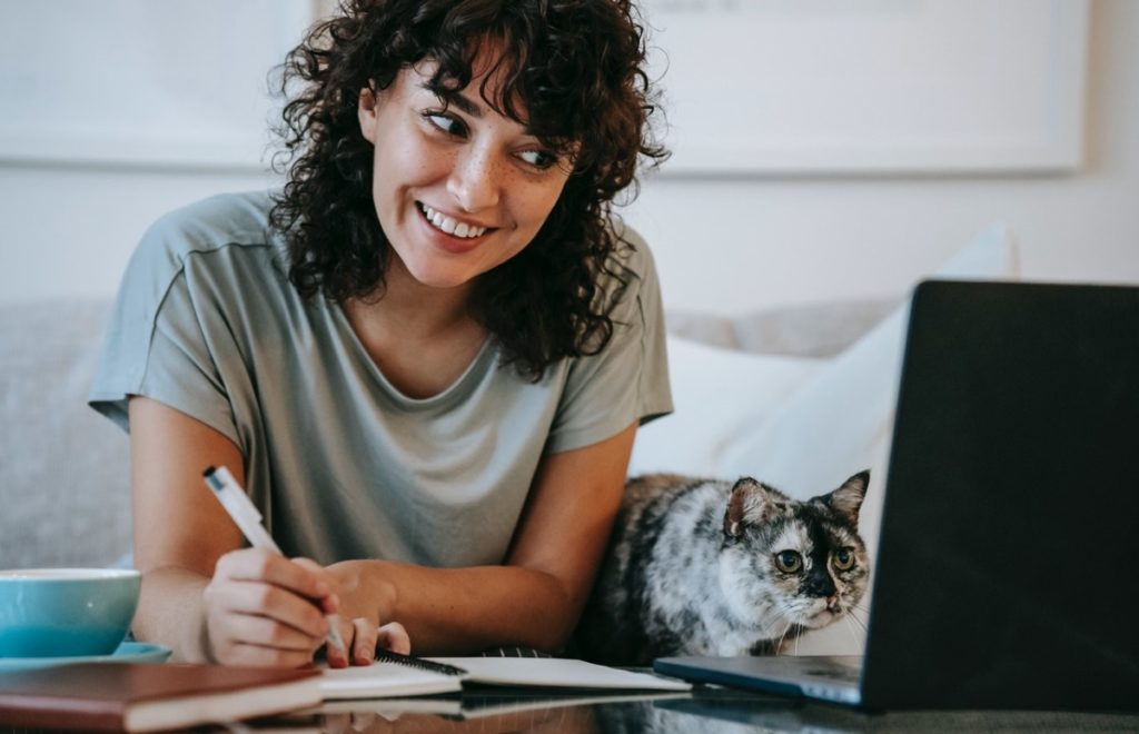 woman taking notes