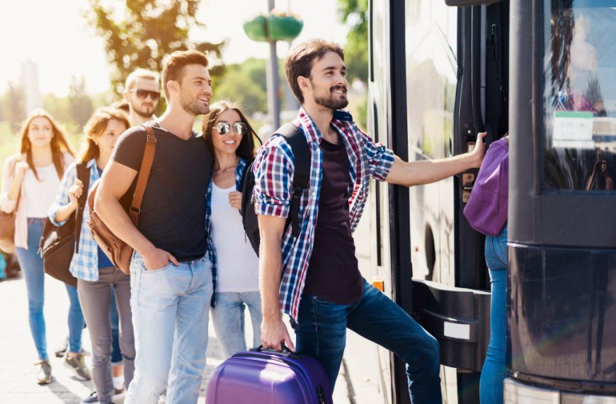 travelers getting on the bus