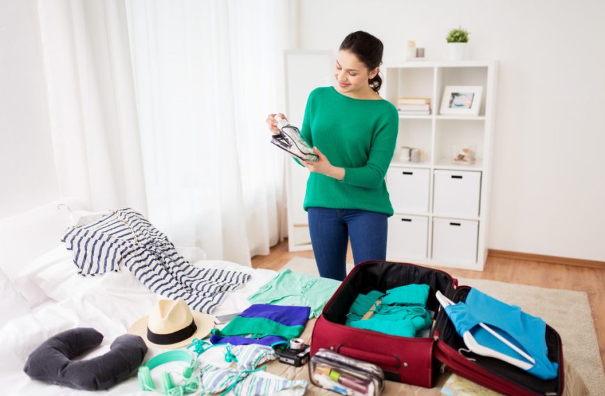 a woman packing for a trip