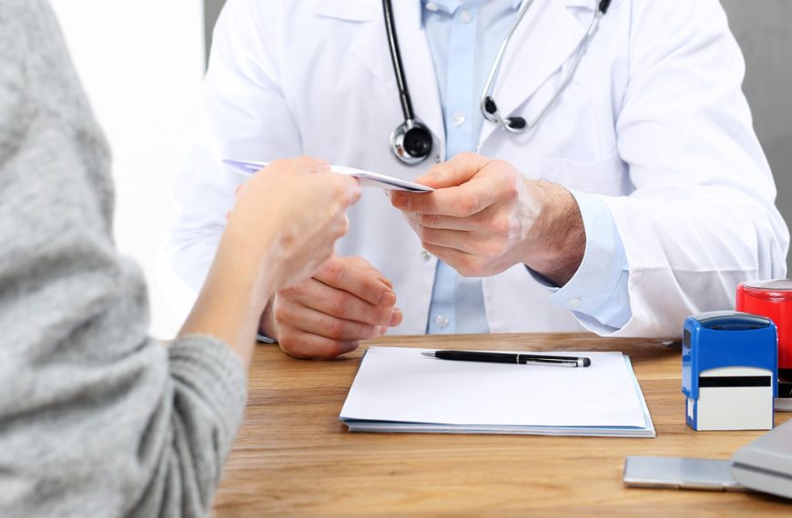 Retiree consulting a doctor