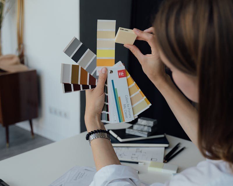 an interior designer choosing the best colors for a project
